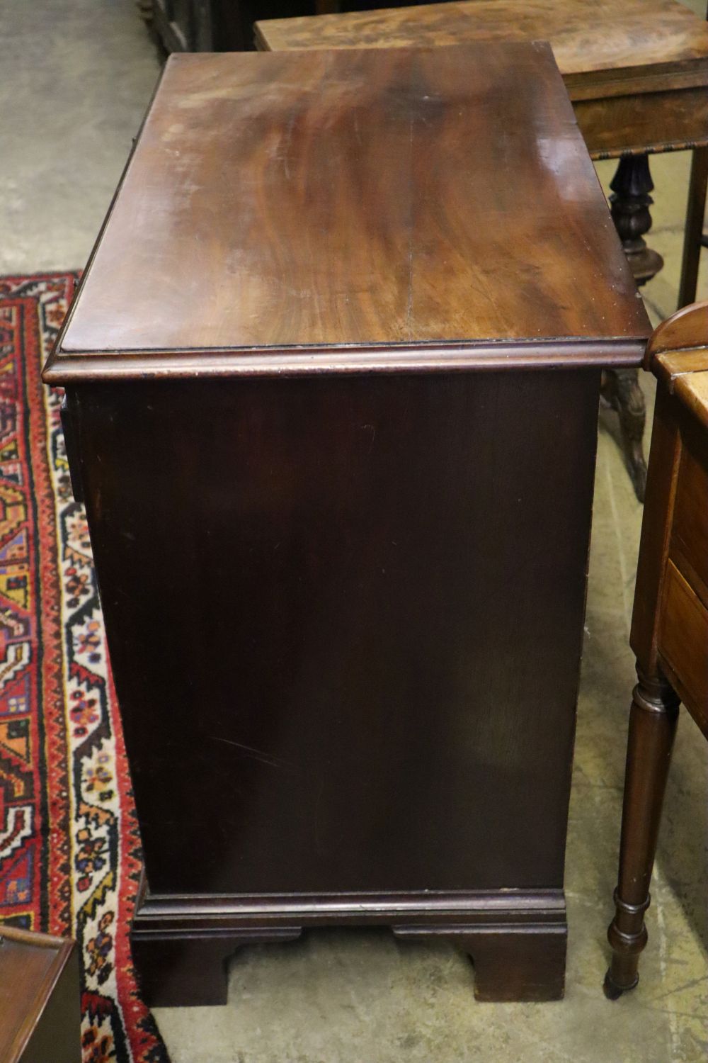 A George III mahogany chest of drawers with brushing slide, width 86cm depth 50cm height 82cm